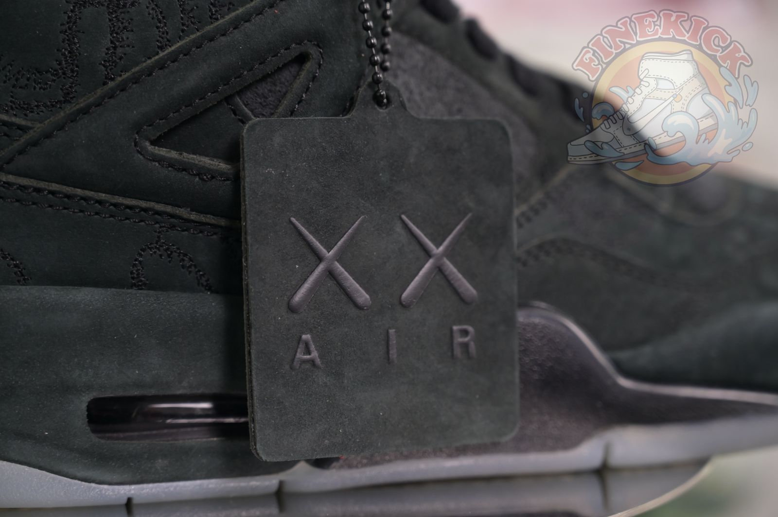 Air Jordan 4 kaws black