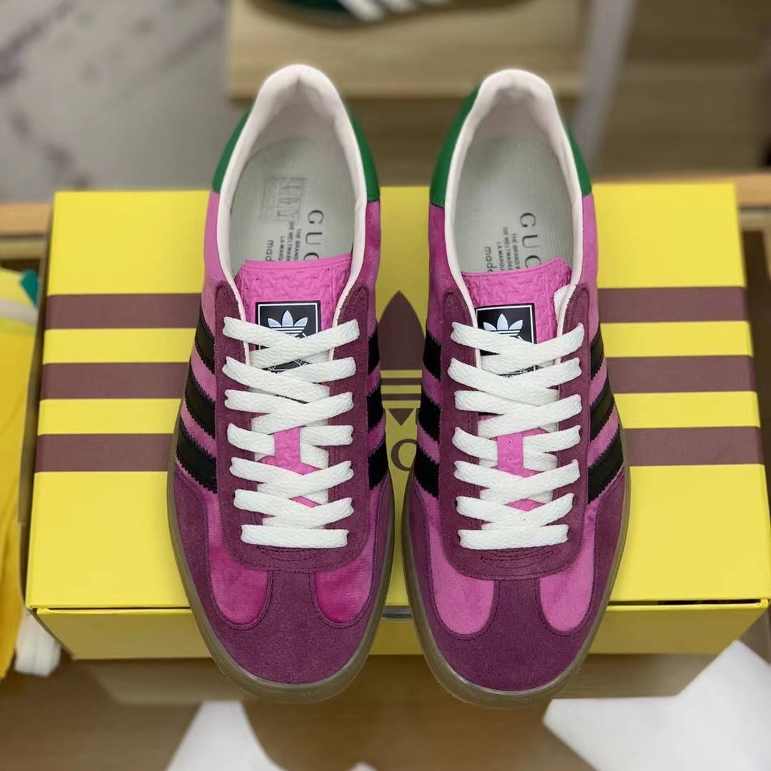 GU*I× Adidas sneakers