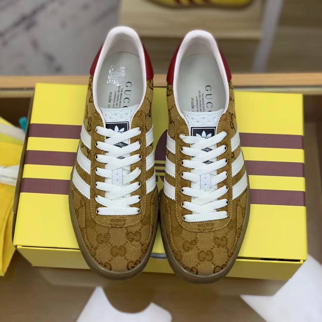 GU*I× Adidas sneakers