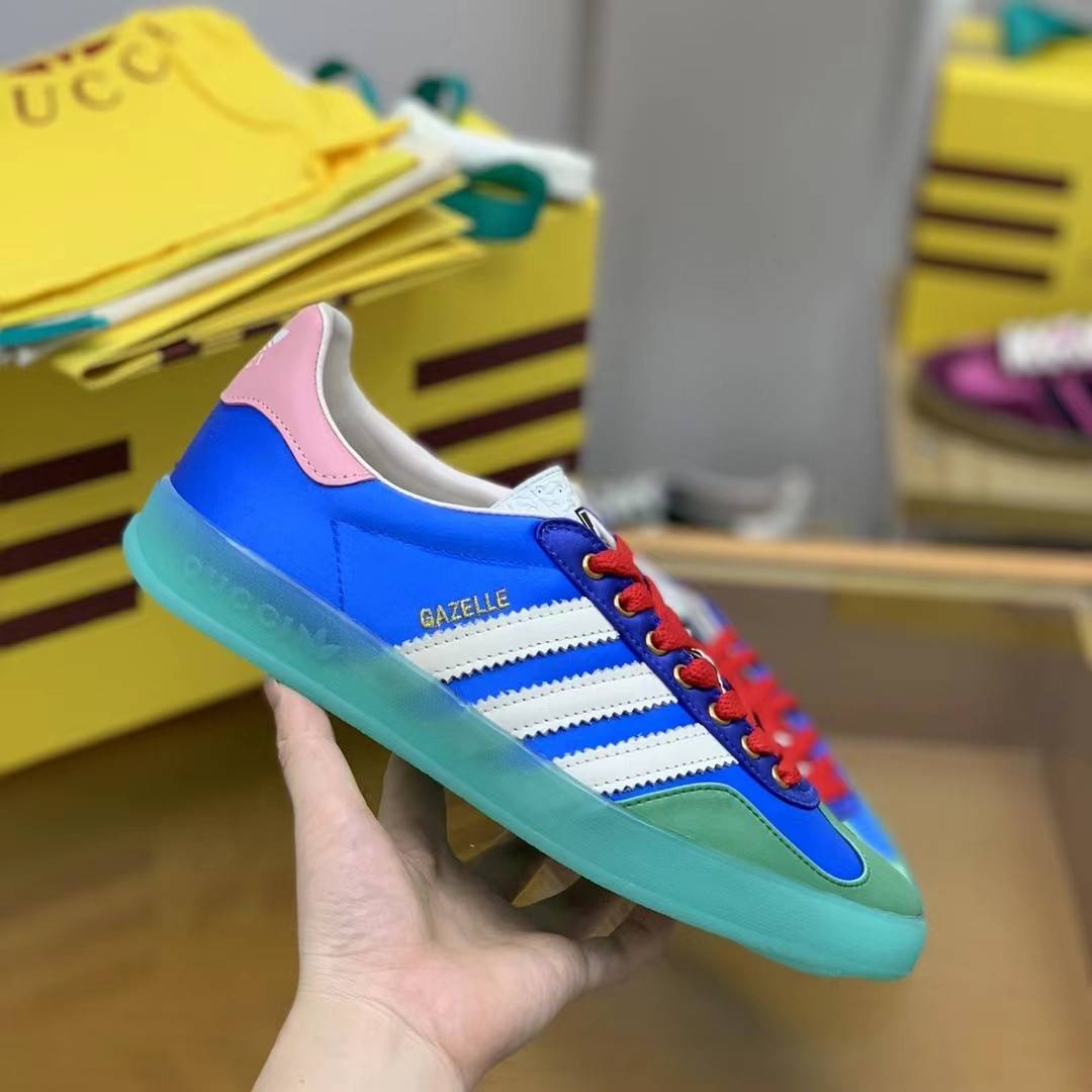 GU*I× Adidas sneakers