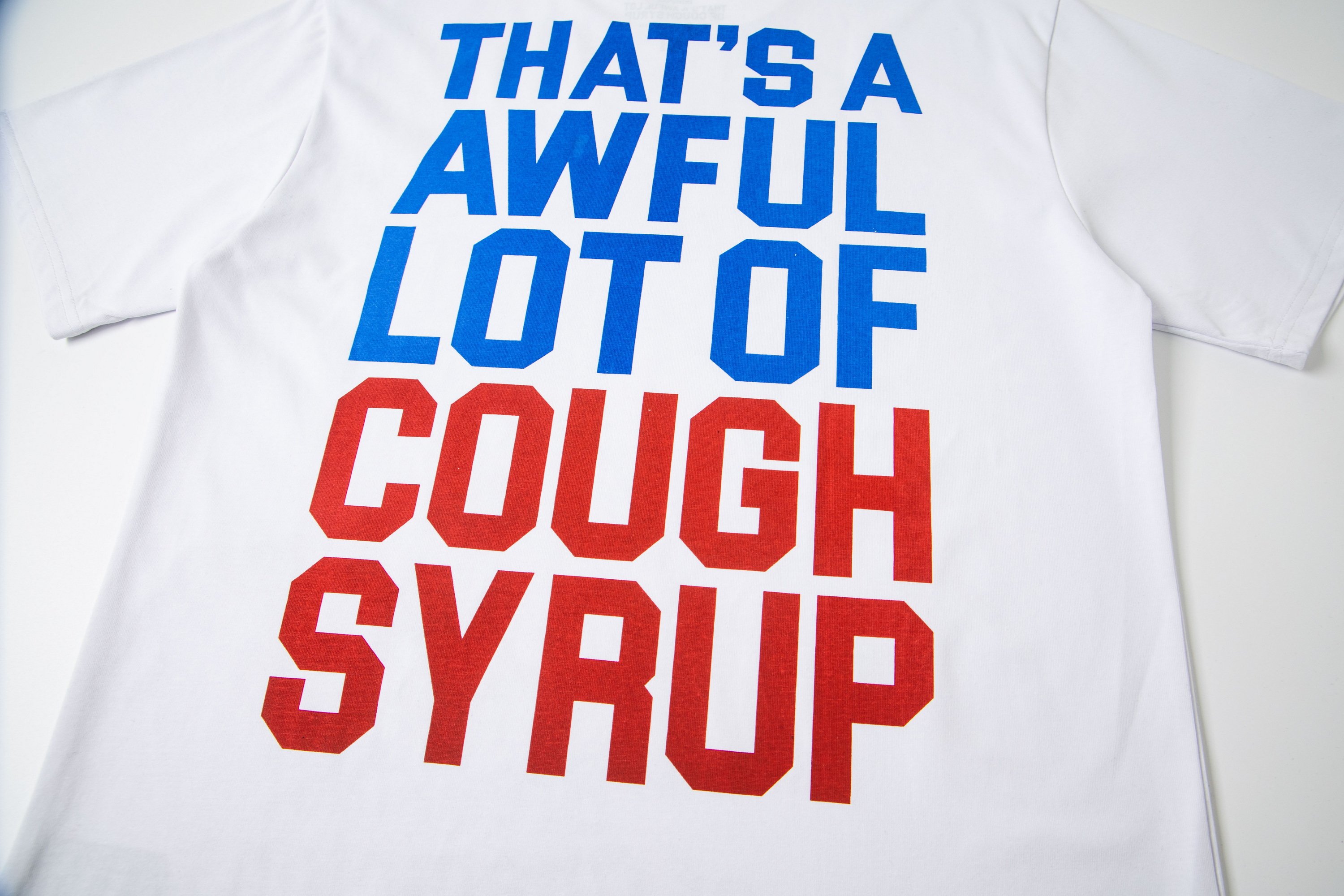 THAT'S A AWFUL LOT OF COUGH SYRUP The Breakfast of Champions Tee