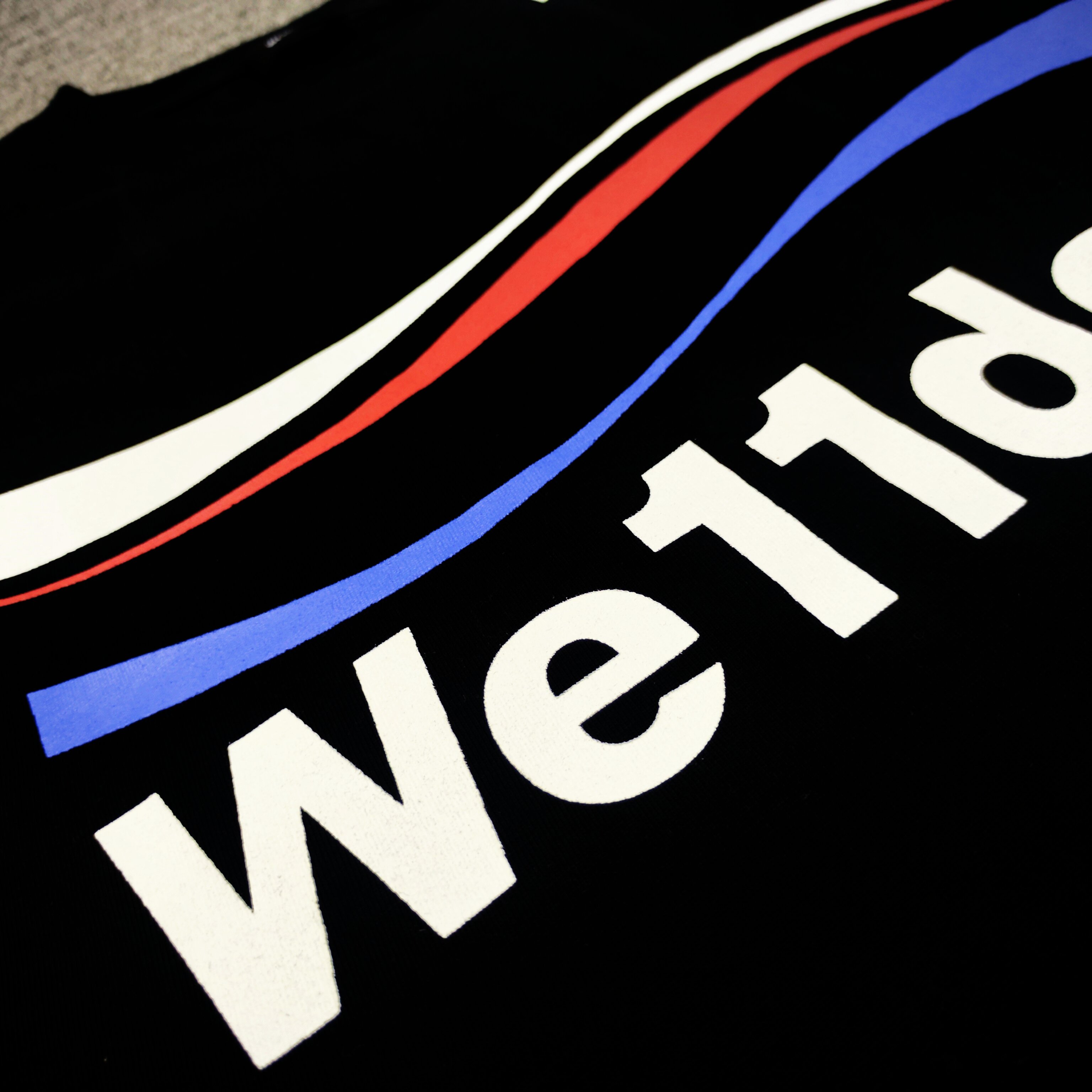 WE11D0NETRACK Sea wave with three stripes T-Shirt