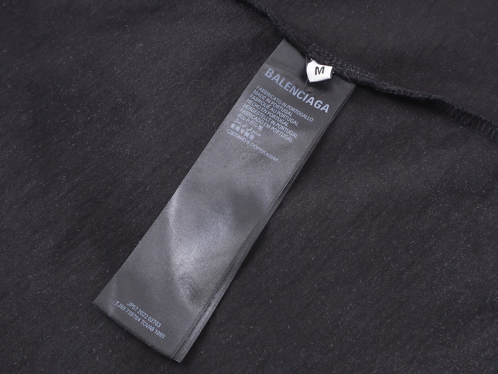 Balanciag@ Graffiti distressed long-sleeve shirt. 2025