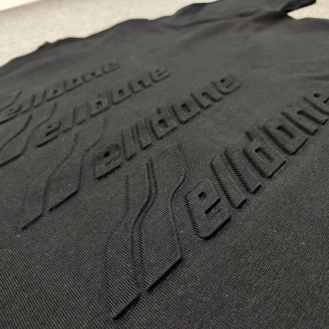 WE11D0NE TRACK Embossed Banner T-Shirt